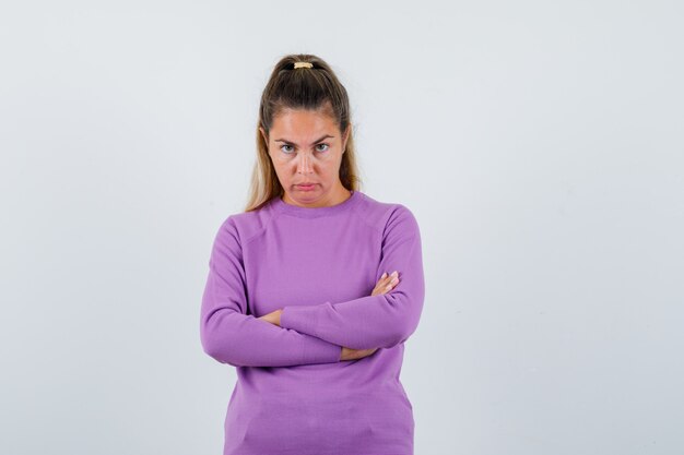 Expressive young girl posing in the studio