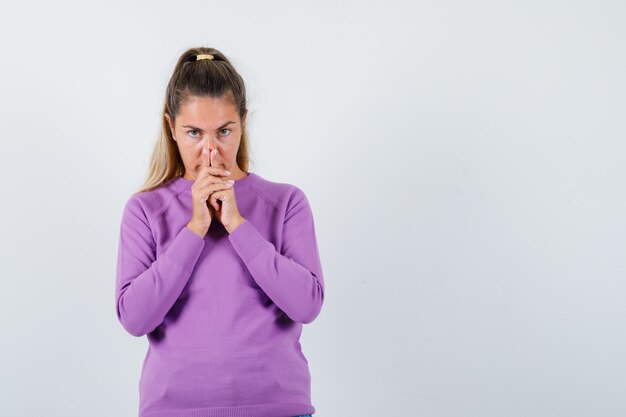 Expressive young girl posing in the studio