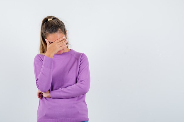 Expressive young girl posing in the studio