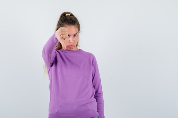 Expressive young girl posing in the studio