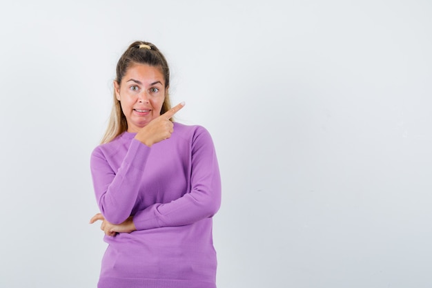 Expressive young girl posing in the studio