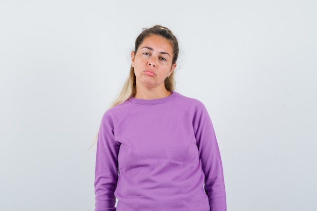 Expressive young girl posing in the studio