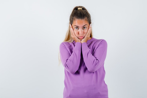 Expressive young girl posing in the studio