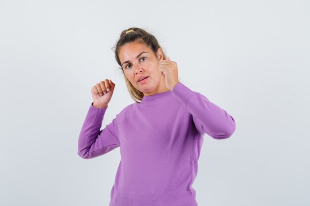 Expressive young girl posing in the studio