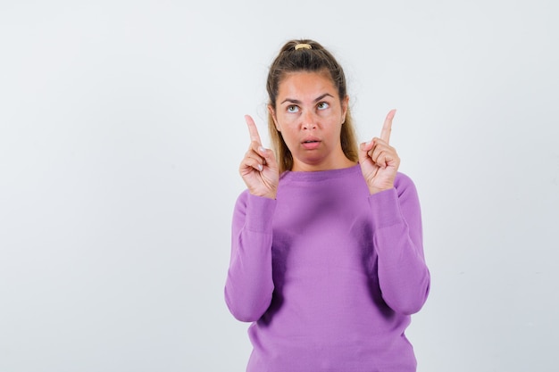 Expressive young girl posing in the studio