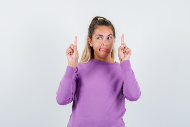 Expressive young girl posing in the studio