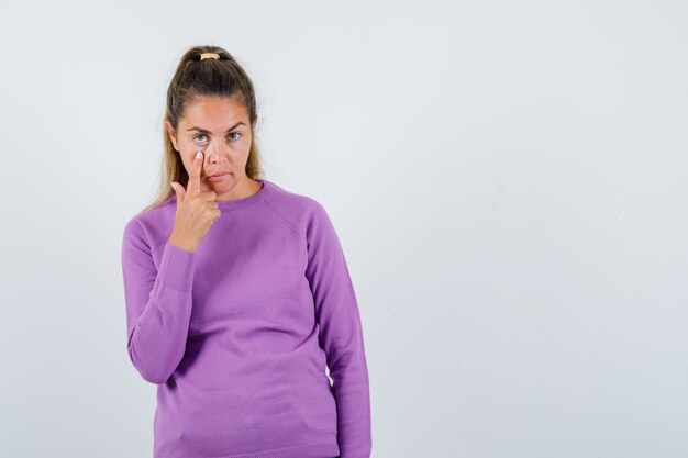 Expressive young girl posing in the studio