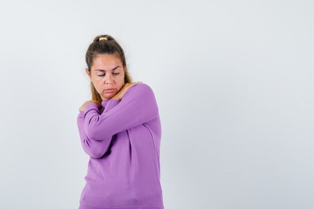 Expressive young girl posing in the studio