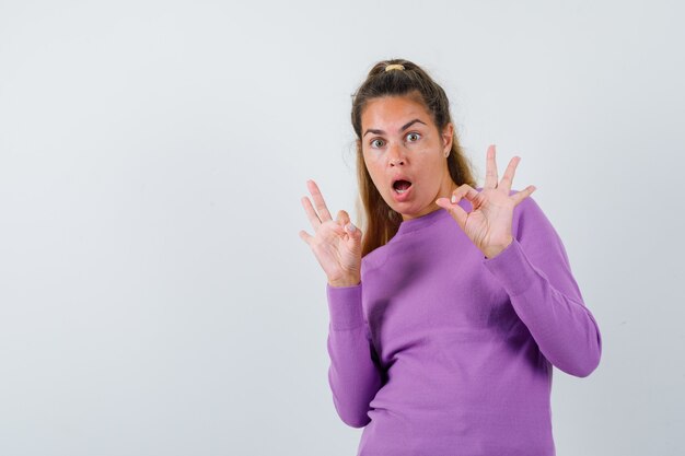 Expressive young girl posing in the studio