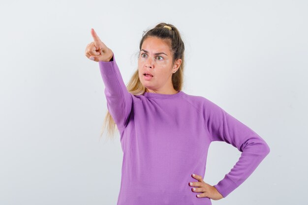 Expressive young girl posing in the studio