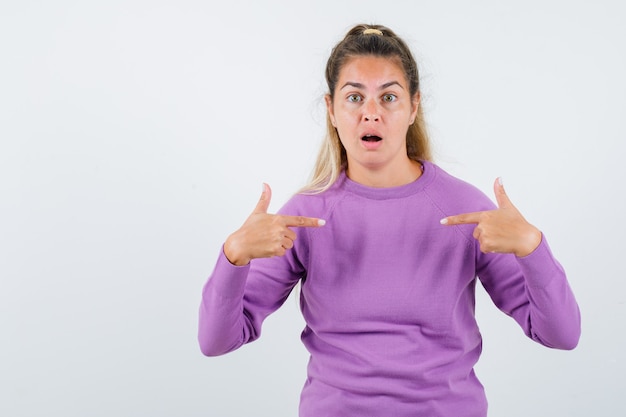 Expressive young girl posing in the studio