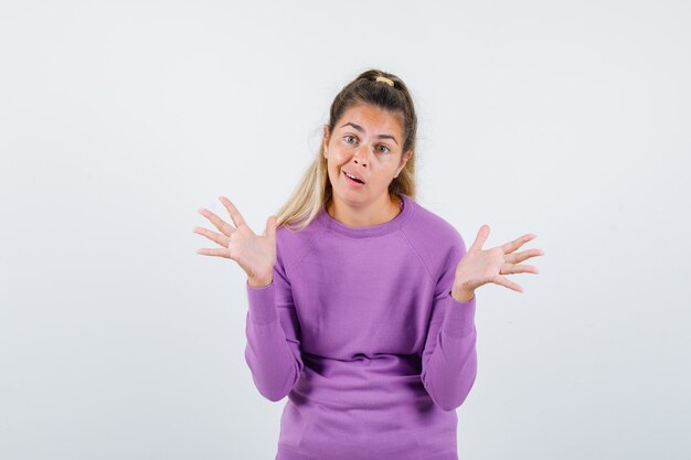 Expressive young girl posing in the studio