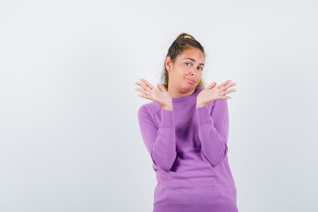 Expressive young girl posing in the studio