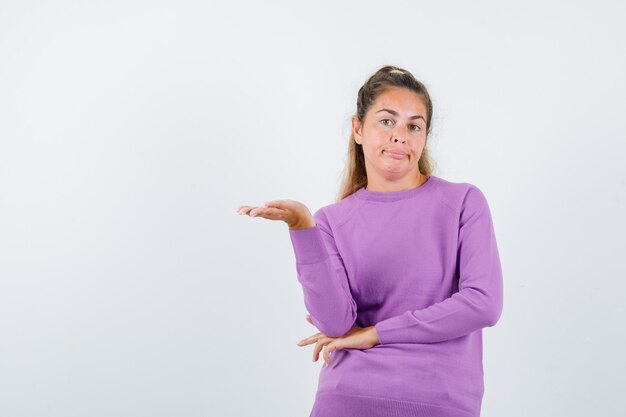 Expressive young girl posing in the studio