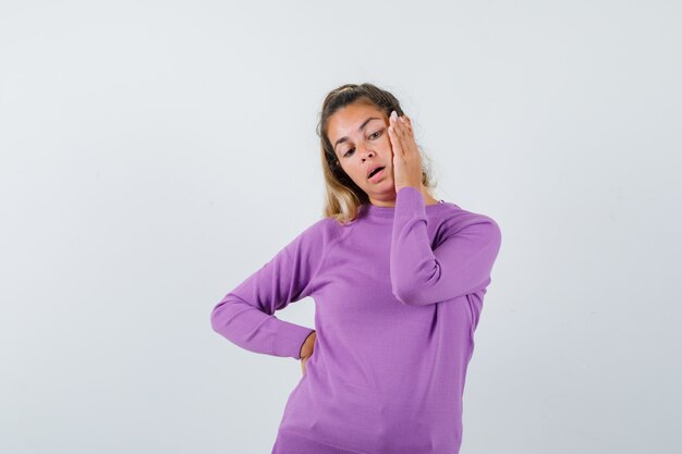 Expressive young girl posing in the studio