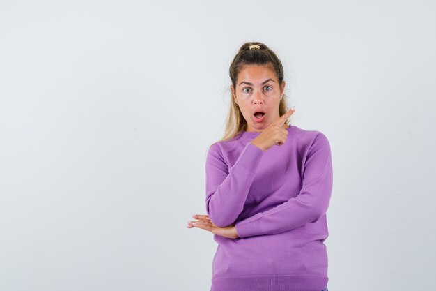 Expressive young girl posing in the studio