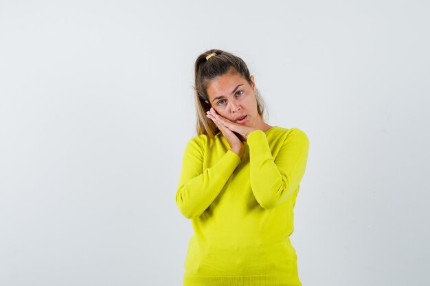 Expressive young girl posing in the studio