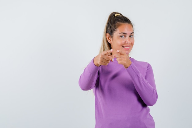 Expressive young girl posing in the studio