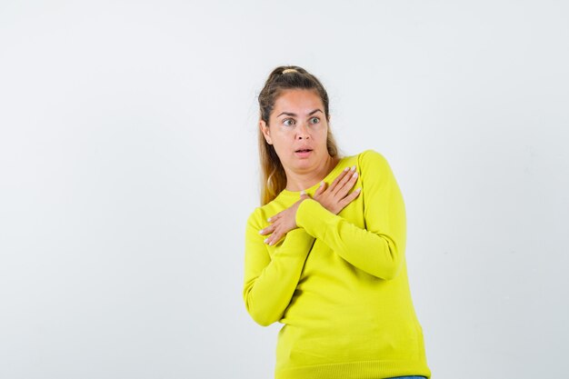 Expressive young girl posing in the studio