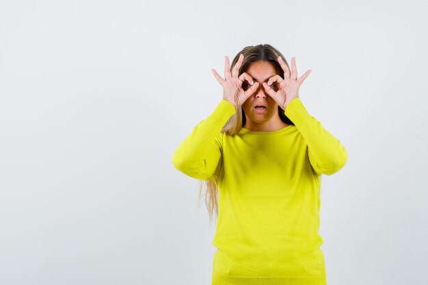 Expressive young girl posing in the studio