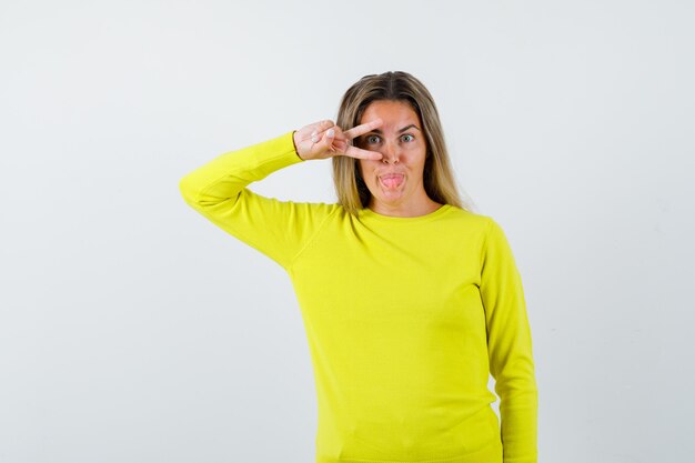 Expressive young girl posing in the studio