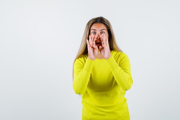 Expressive young girl posing in the studio