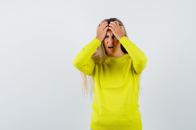 Expressive young girl posing in the studio