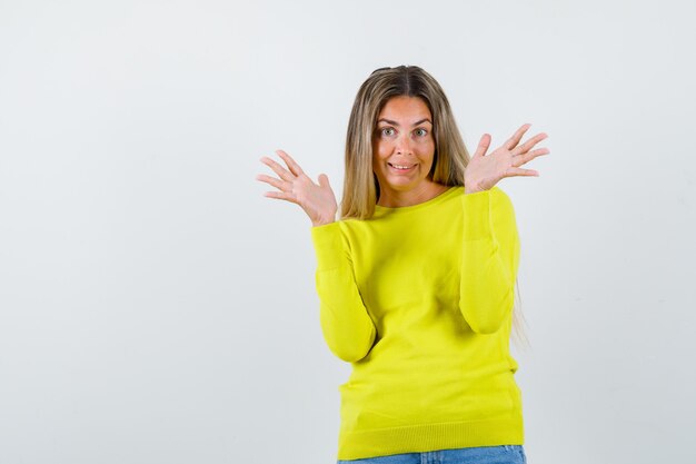 Expressive young girl posing in the studio