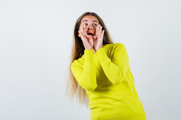 Expressive young girl posing in the studio