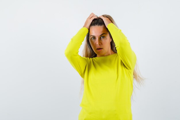 Expressive young girl posing in the studio