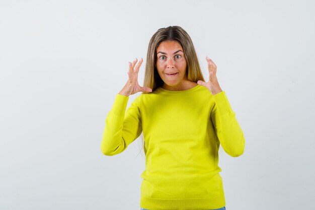 Expressive young girl posing in the studio