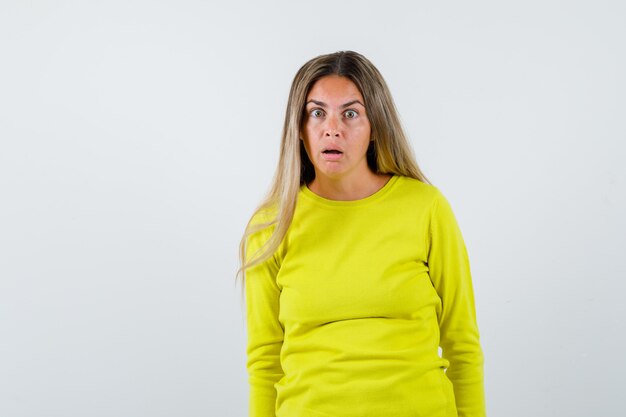 Expressive young girl posing in the studio