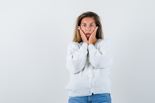 Expressive young girl posing in the studio