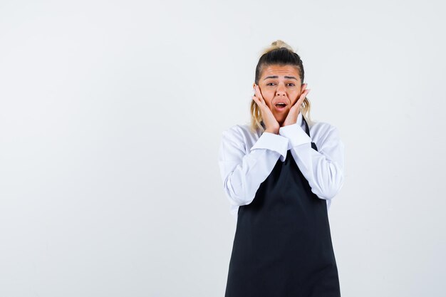 Expressive young girl posing in the studio