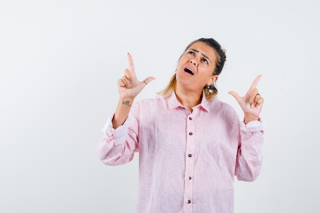 Expressive young girl posing in the studio