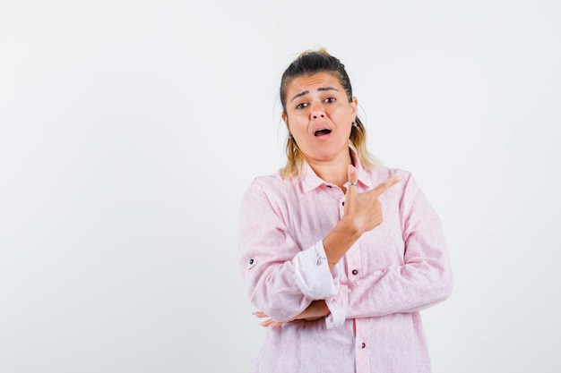 Expressive young girl posing in the studio