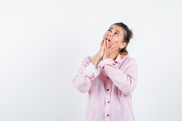 Expressive young girl posing in the studio