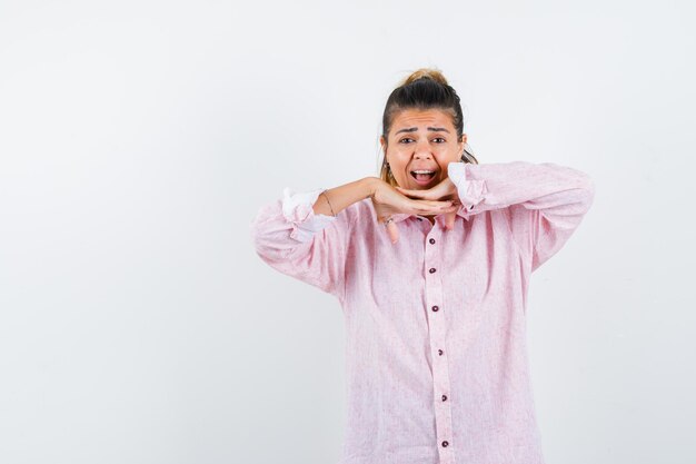 Expressive young girl posing in the studio