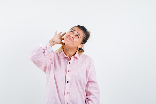 Expressive young girl posing in the studio