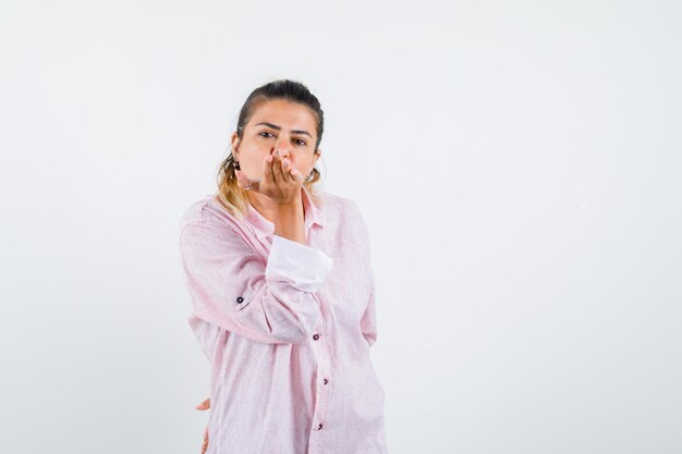 Expressive young girl posing in the studio