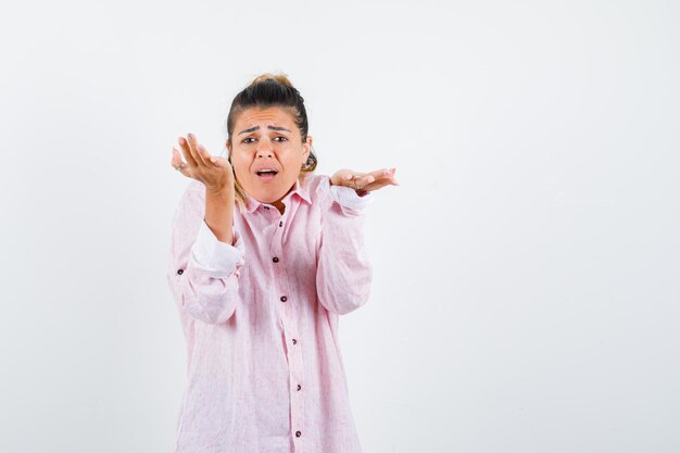 Expressive young girl posing in the studio