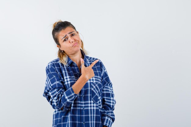 Expressive young girl posing in the studio