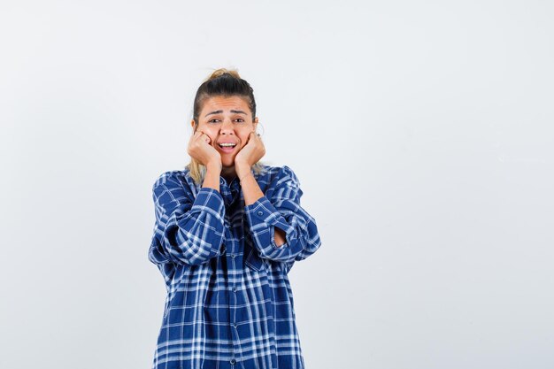 Expressive young girl posing in the studio