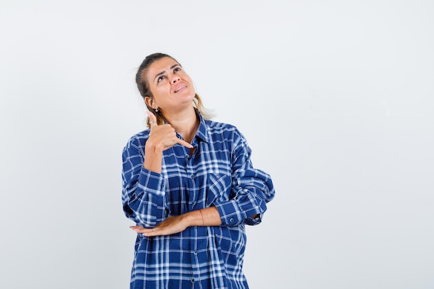 Expressive young girl posing in the studio