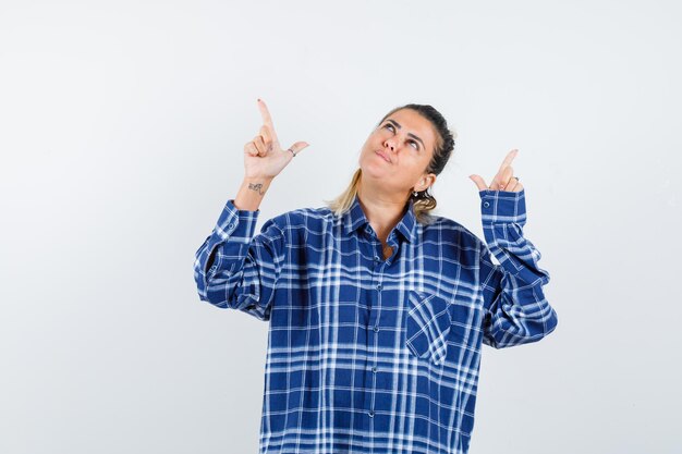 Expressive young girl posing in the studio