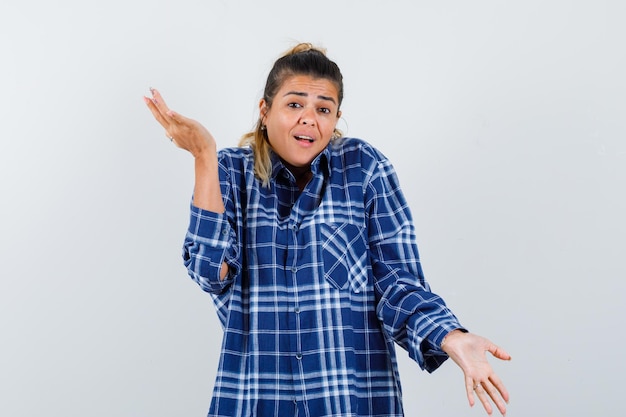 Expressive young girl posing in the studio