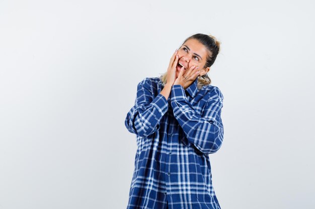 Expressive young girl posing in the studio