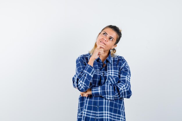 Expressive young girl posing in the studio