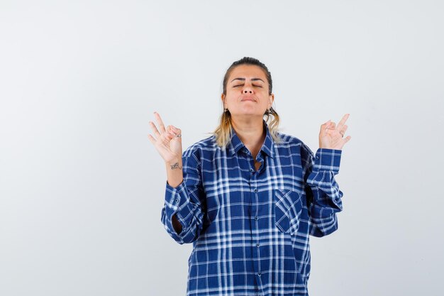 Expressive young girl posing in the studio