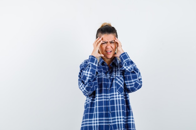 Expressive young girl posing in the studio